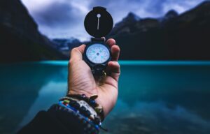 Person holding compass