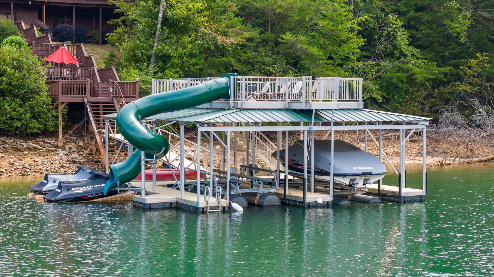 Boat Dock And Water SlideOf Vacation Rental Medley Sunset Cove