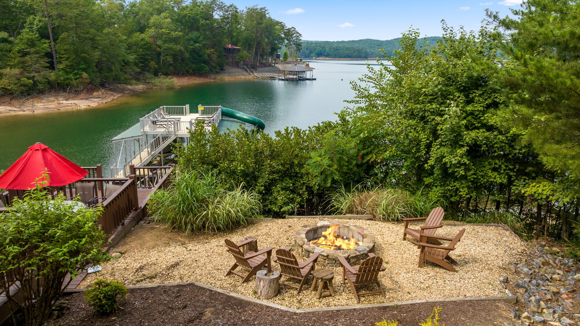 Fire Pit and Deck Of Vacation Rental Medley Sunset Cove